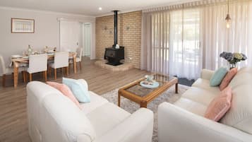 Smart TV, fireplace, DVD player, books