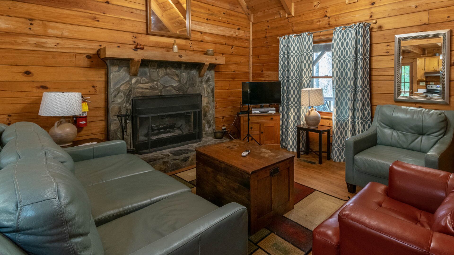 Cabin with a fire place in the woods