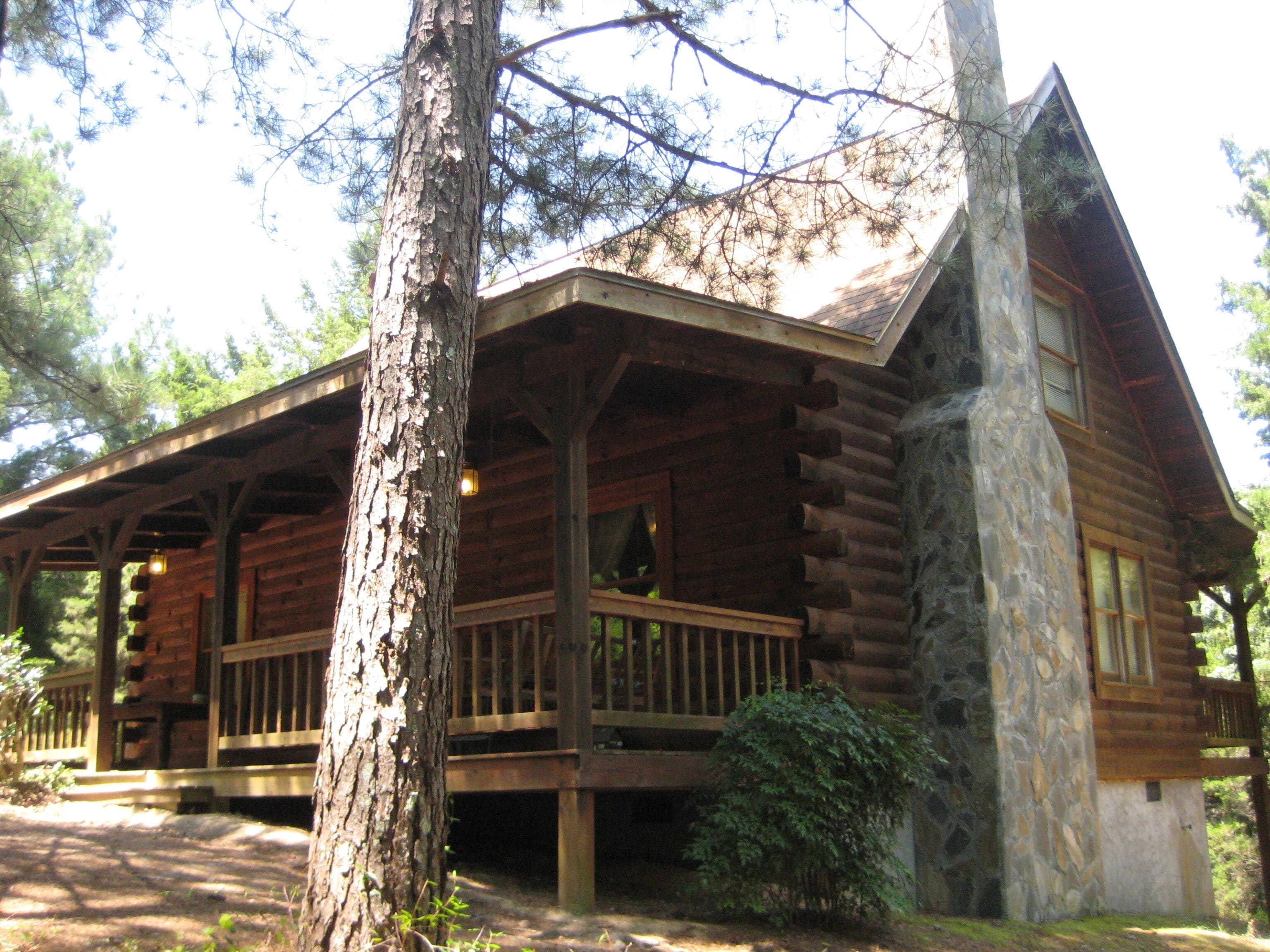 Cabin with a fire place in the woods