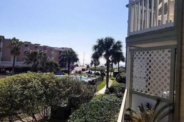 View from the balcony looking out towards the Gulf. Also it shows 1 of the pools