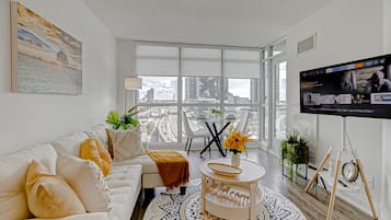 Executive Apartment, 1 Bedroom, Balcony, City View | Living area | 43-inch flat-screen TV with cable channels, TV, Netflix