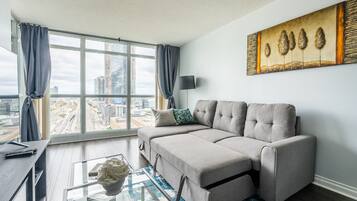 Design Apartment, Multiple Beds, Kitchen, City View | Living area | 43-inch flat-screen TV with cable channels, TV, Netflix