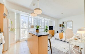 Deluxe Studio, Kitchen, City View | Individually decorated, individually furnished, desk, iron/ironing board - Yonge Street Downtown Toronto Condos (Toronto)