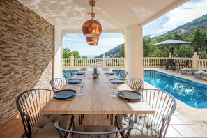 Outdoor dining - Luxury modern villa with spectacular views of sea and heated private pool (La Herradura)
