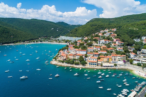 Rabac beach and harbour view