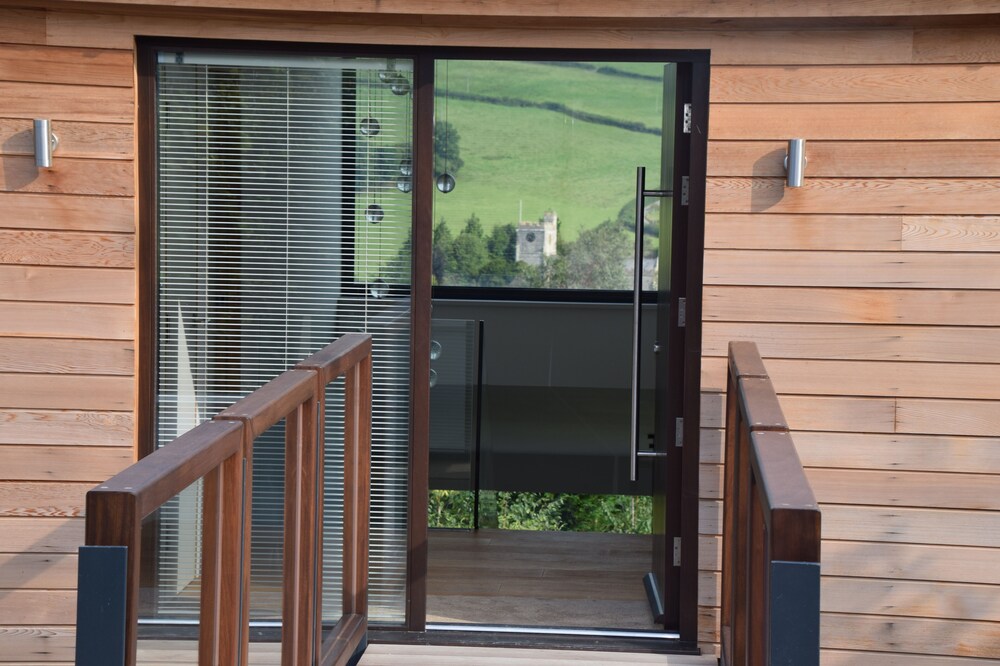 The Cedar House in Lyme Regis. Luxurious contemporary home. Mesmerising views.