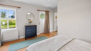 1 bedroom, desk, iron/ironing board, travel cot