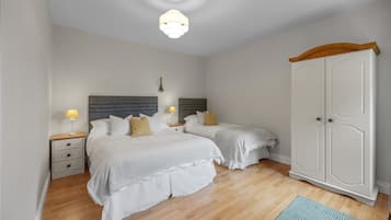 1 bedroom, desk, iron/ironing board, travel crib