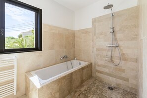 Combined shower/tub, hair dryer, towels, toilet paper