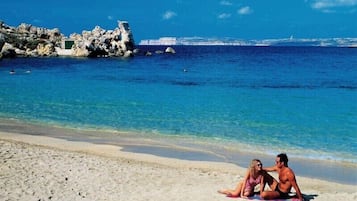 Beach nearby, sun loungers