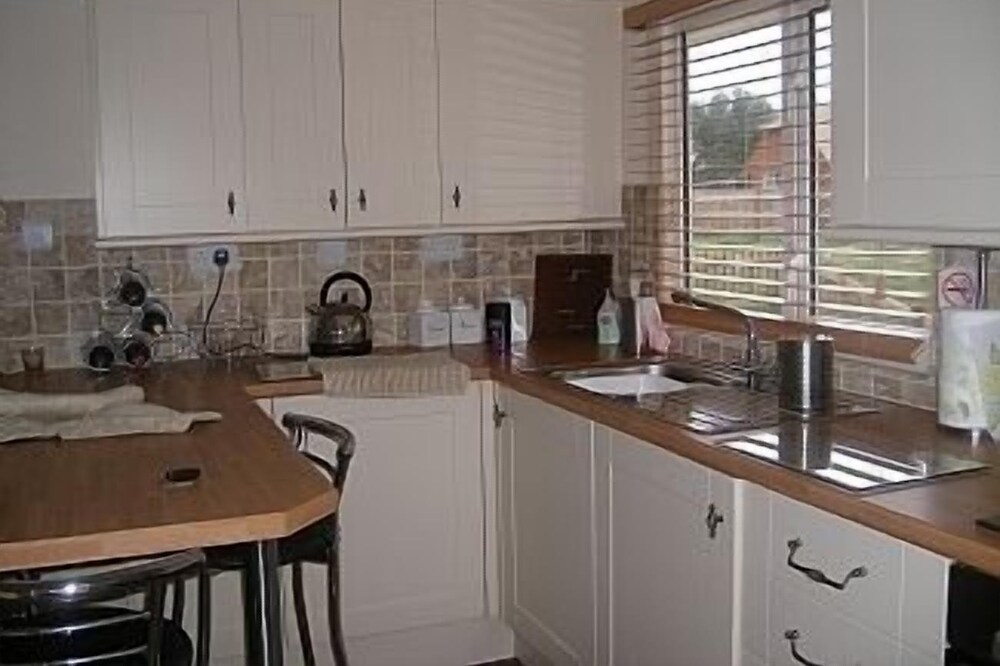 Chalet on small peaceful site with shared heated outdoor pool.
