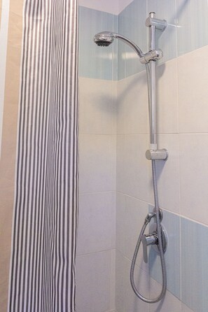 Shower, towels, soap, shampoo