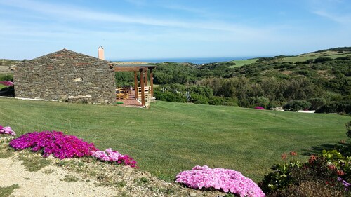 Frei stehendes Ferienhaus mit Meerblick
