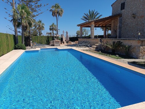 A rural estate with pool, large garden and sea views.