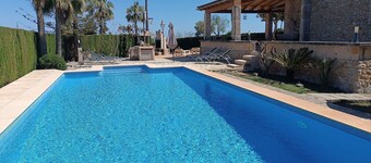 A rural estate with pool, large garden and sea views.