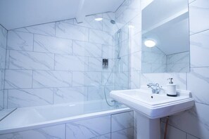 Shower, free toiletries, hair dryer