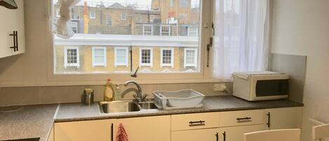 Fridge, microwave, dishwasher, coffee/tea maker