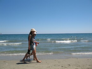 On the beach, sun loungers
