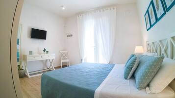 4 habitaciones, tabla de planchar con plancha, cuna de viaje y wifi