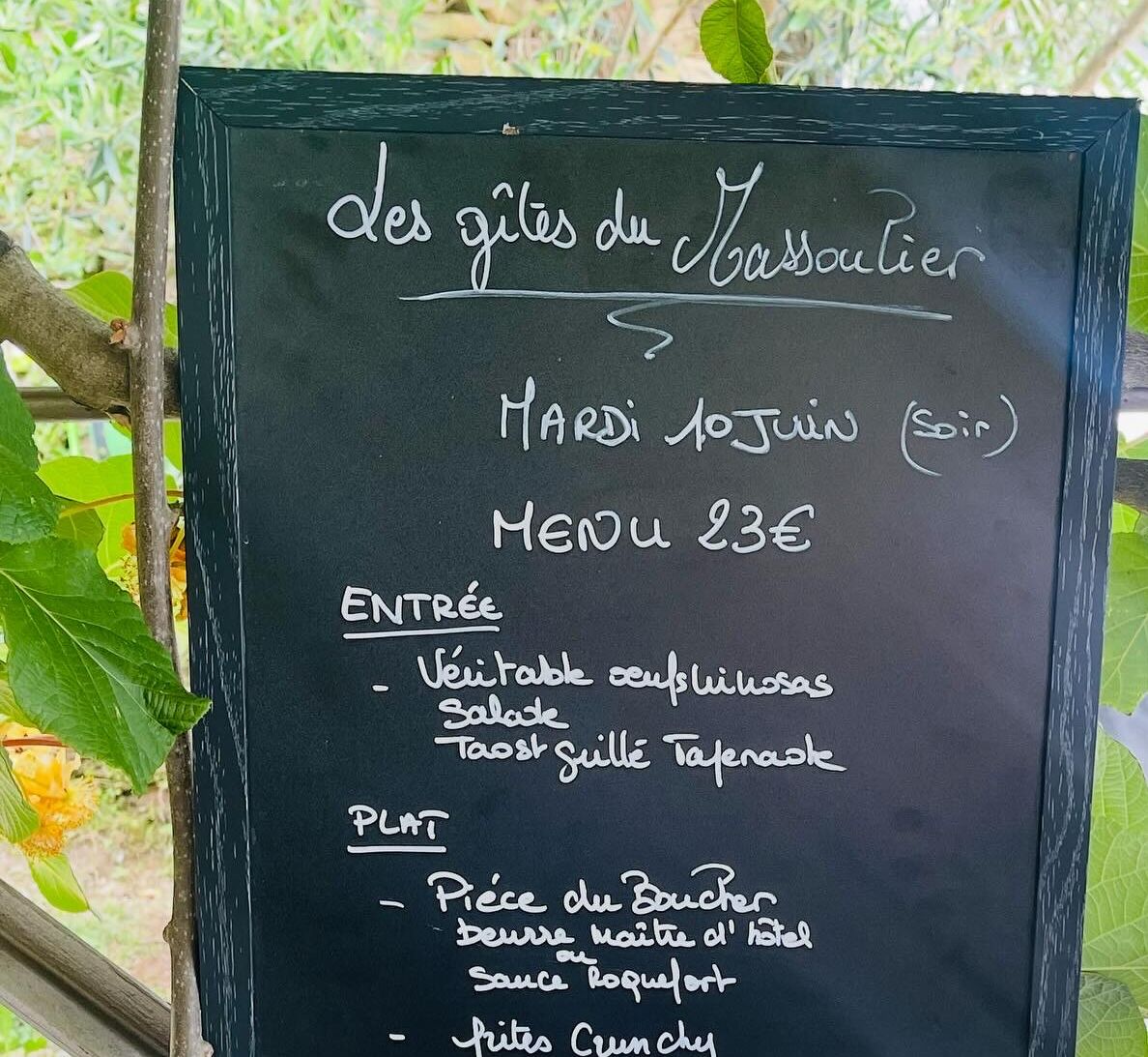 A chalkboard menu for 'des gîtes du Massouier' on a Friday evening, priced at 23€.