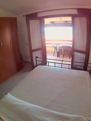 1 habitación y ropa de cama