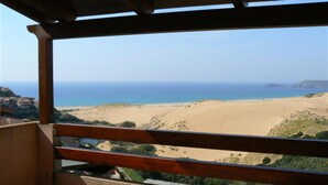 A balcony with a view of a beach and the sea. - TORRE DEI CORSARI, THE PEARL OF THE GREEN COAST - IUN Code: P7053 (Arbus)
