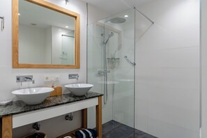 Combined shower/tub, hair dryer, towels, soap