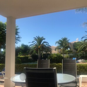Outdoor dining - Superb 2 Bed Apartment with pool near to beach (Porto De Mos)