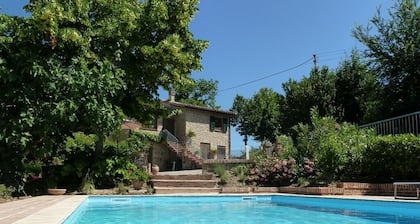 Idyllic character cottage set in landscaped garden with a private pool