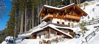 detached holiday house located forest edge, elevated above Großarl-Valley