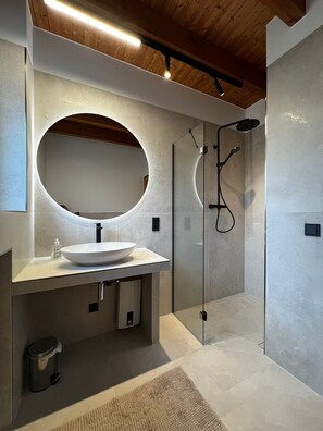 Bathtub, hair dryer, towels, soap