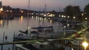 A marina with boats docked at the pier. - family-friendly, comfortable accommodation, 2 terraces, 200 m to the beach (Neustadt in Holstein)