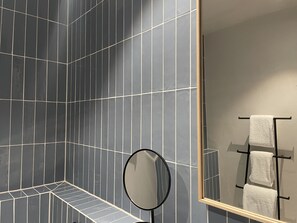 Bathtub, hair dryer, towels, soap