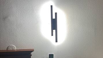 1 habitación, tabla de planchar con plancha, cuna de viaje y wifi