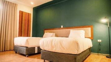 Traditionellt trippelrum - eget badrum | Ljudisolering, gratis wi-fi och sängkläder