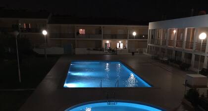 Holiday apartment in residence with shared swimming pool