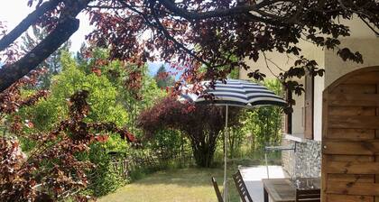 Large T2 on the garden level of CHALET in BARCELONNETTE (04400)