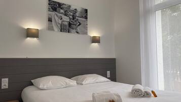 3 slaapkamers, een strijkplank/strijkijzer, reisbedje, wifi