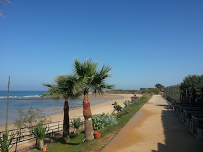 On the beach, sun loungers