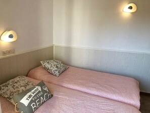 1 dormitorio, tabla de planchar con plancha, cuna de viaje y wifi gratis