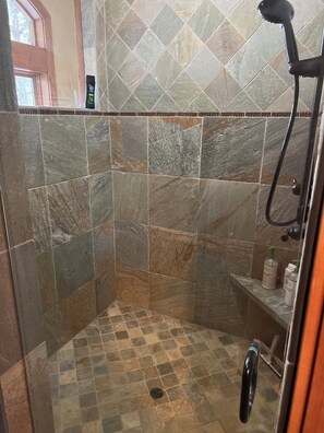 Combined shower/tub, hair dryer, towels, soap