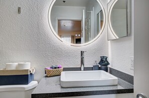 Combined shower/bathtub, hair dryer, towels, soap