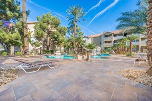 Outdoor pool, a heated pool - Fantastic Strip view walking distance 2br2b condo (Las Vegas)