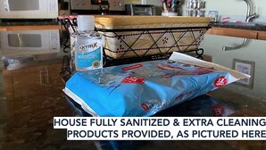 A kitchen with a microwave, a bottle of Germ-X, and a pack of wipes on the counter. - Lake Ontario waterfront home, close to Erie Canal & Niagara Falls (Lyndonville)
