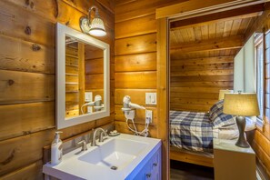 Combined shower/bathtub, hair dryer, towels, soap