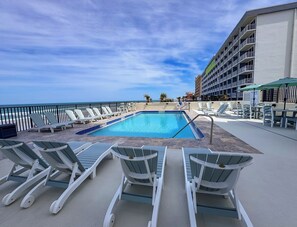 A heated pool - Newly Renovated Oceanfront Pool & Deck- GORGEOUS Ocean Views!!! (Daytona Beach Shores)