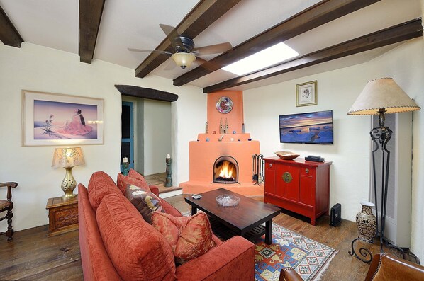 Smart TV, fireplace, books