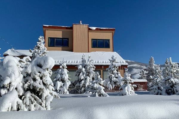 Front exterior view on a sunny winter day