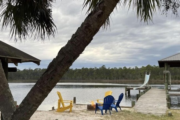 Absolute Paradise. Enjoy sitting by the water under the Tiki Hut!