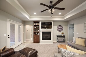 Smart TV, fireplace, books